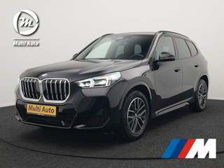 BMW X1 sDrive18i M-Sport Automaat Nieuw Model Dealer O.H. | Trekhaak af Fabriek | Alcantara Sportstoelen Memory & Verwarmd | Camera | Cruise Control | Blis | Park Assist | Apple Carplay | Navigatie | Sfeerverlichting |