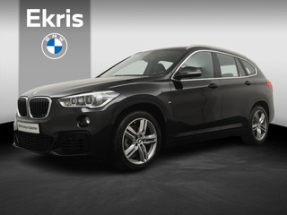 Hoofdafbeelding BMW X1 BMW X1 sDrive18i High Executive Edition B| M Sport | Trekhaak | Leder | Stoelverwarming | Parkeersensoren voor en achter | Head-Up Display | Navigatie |