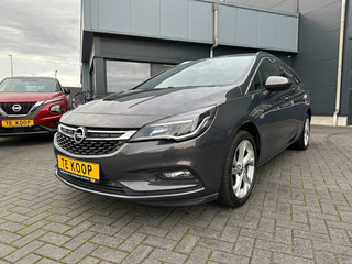Hoofdafbeelding Opel Astra Opel Astra Sportstourer 1.4 Turbo Navigatie 1ste eigenaar