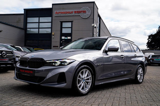 BMW 3-serie Touring 320e | Panorama | Elektrische trekhaak | Luxe Leder/stof | Achteruitrijcamera | Shadowline | Stoelverwarming |
