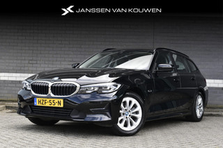 BMW 3-serie Touring 320e / 93% SOH / PHEV / Sportstoelen / Stoelverwarming / Half-Leder / Alarm Klasse 3