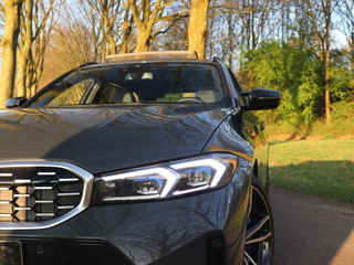 BMW 3 Serie BMW 3 Serie Touring M340i xDrive M-Sport | Pano | Leder | HUD | HiFi | 19