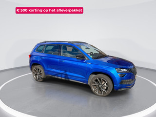 Hoofdafbeelding Škoda Karoq Skoda Karoq 1.5 TSI ACT 150pk DSG Sportline Business · Panoramadak · Camera · Trekhaak · Apple/Android Car Play · 19'' LMV · Keyless ·