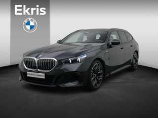 BMW 5 Serie Touring 530e M Sportpakket | Travel Pack | Comfort Access | Extra Getint Glas Achter | Trekhaak | Driving Assistant Plus | DAB | 20''
