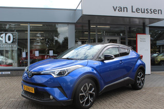 Toyota C-HR 1.8 HYBRID EXECUTIVE BI-TONE STOELVERW. NAVI AD-CRUISE CAMERA CLIMA EL-LENDESTEUN