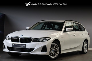 Hoofdafbeelding BMW 3 Serie BMW 3-serie Touring 320e Facelift SOH 98% Lederen Sportstoelen LED Koplampen Navi Live Cockpit Plus