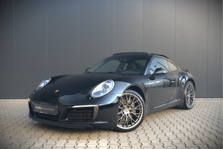 Porsche 911 3.0 Carrera | Panoramadak | Bose | Sport Chrono | Sport Uitlaat | Spyder RS Design Velgen | GT Sportstuur | Stoelverwarming | Stuurverwarming | Navigatie | Cruise Control | Leer | Apple Carplay | Origine