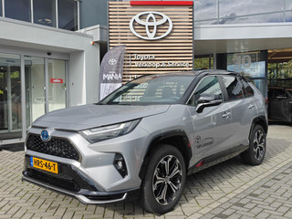 Toyota RAV4 2.5 Plug-in Hybrid AWD Bi-Tone Plus STOEL/STUURVERW STOELVENT NAVI 360-CAMERA PARKSENSOREN HEAD-UP APPLE/ANDROID LEDER BLINDSPOT EL-STOEL+GEHEUGEN JBL-AUDIO EL-ACHTERKLEP 19"LMV