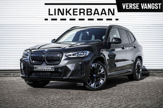 Hoofdafbeelding BMW iX3 BMW iX3 High Executive 80 kWh | M Sport | Full Option | Panodak | Laser | Driving Assistant Prof | HUD | H&K | 20 inch |