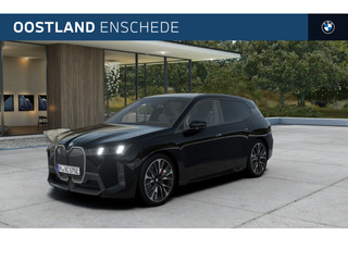 BMW iX xDrive60 M Sport / Panoramadak / Trekhaak / Adaptief onderstel / Soft-Close / Stoelventilatie / Parking Assistant Professional / Adaptieve LED / Harman Kardon