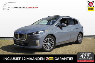 BMW 2-serie Active Tourer 225e xDrive Luxury Line // Copper Grey Metallic - Elek. Panoramadak - Harman Kardon - Houtafwerking - Sensatec - Camera - Stoelverwarming
