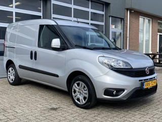Hoofdafbeelding Fiat Doblò Fiat Doblò Cargo 1.3 MJ L1H1 SX 90pk Btw en Bpm vrij Airco Cruise controle Navigatie Tussenschot Parkeerhulp achter 1e eigenaar Ex overheid Euro 5 Marge 20x op voorraad