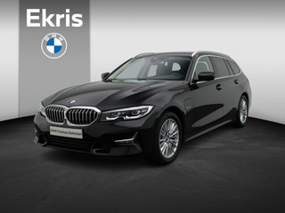 BMW 3 Serie Touring 320e Luxury Line | High Executive | Sportstoelen voor | Live Cockpit Professional | HIFI | 17"