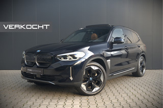 Hoofdafbeelding BMW iX3 BMW iX3 High Executive 80 kWh | Panoramadak | Keyless | Stoelverwarming | Harman Kardon | Memory Seat | Head-Up Display | 360 Camera | Adaptief Onderstel | Trekhaak | Adaptive LED | Elektrische Stoelen | Apple Carplay | N