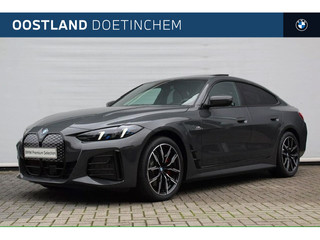 BMW i4 eDrive40 Gran Coupé M Sport / Schuif-kanteldak / Achteruitrijcamera / Adaptieve LED / Active Cruise Control / Comfort Access / Stuurverwarming