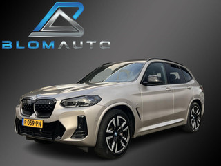 Hoofdafbeelding BMW iX3 BMW iX3 M-SPORT 80 kWh 286PK PANO+SFEER+LEDER €28.595 EX BTW