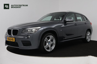 BMW X1 SDrive20i High Executive (STOELVERWARMING, LEER, NAVIGATIE, AUTOMAAT, CRUISE CONTROL, PARKEERSENSOREN, GOED ONDERHOUDEN)