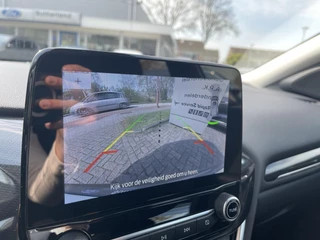 Ford Puma Ford Puma 1.0 EcoBoost Hybrid Titanium 125pk | Winterpack | Climate control | Achteruitrijcamera | Navigatie - afbeelding nr 25