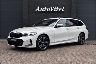 BMW 3 Serie Touring 330e M-Sport | 19,5 kWh Accu | Panodak | Head-Up | Memory | Trekhaak | 360° Camera | Fabrieksgarantie