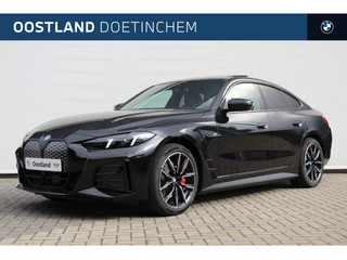 BMW i4 eDrive35 High Executive M Sport / Schuif-kanteldak / Trekhaak / Active Cruise Control / Parking Assistant Plus / Stoelverwarming / Comfort Access / M Adaptief onderstel