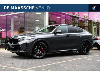 Hoofdafbeelding BMW X6 BMW X6 xDrive40i High Executive M Sport Automaat / Panoramadak / Trekhaak / Massagefunctie / Parking Assistant Professional / Soft-Close / Active Steering