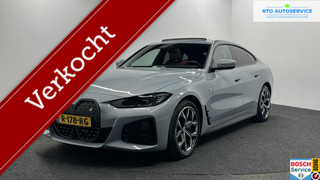 BMW i4 eDrive40 High Executive 84 kWh ADAPTIEF CRUISE CAMERA NAVI LM LEER OPEN DAK.