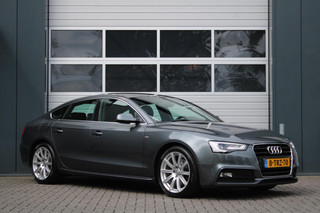 Hoofdafbeelding Audi A5 Audi A5 Sportback 1.8 TFSI Sport Edition S-Line Automaat Clima/Cruise/Navi/Bi-Xenon/Bluetooth/PDC/Sportstoelen/18"/1e.Eig/APK:2026